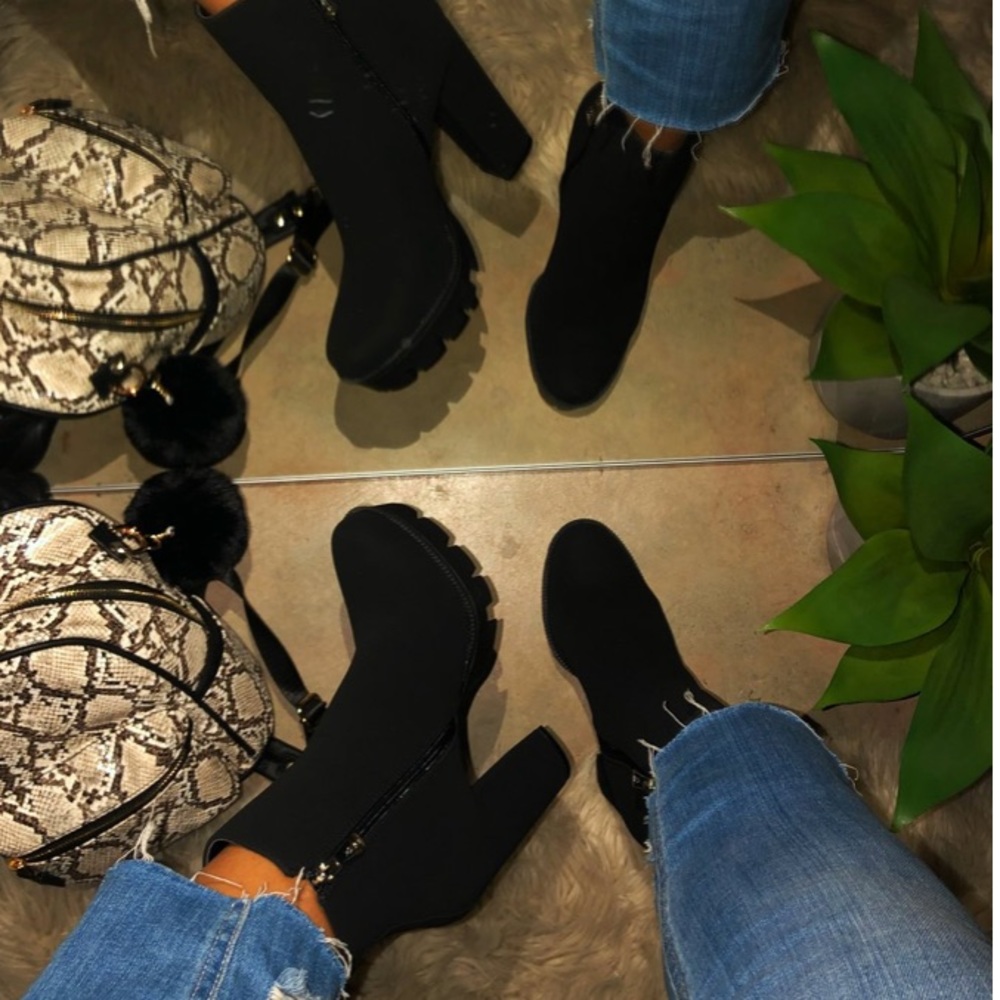 4 1/2 heel high black boots
